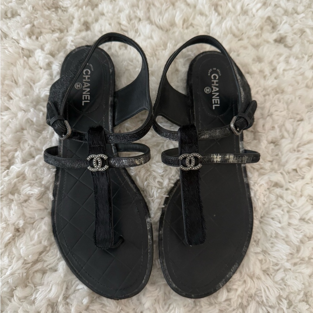 Chanel Black Sandals with Intricate Straps and Adjustable Ankle